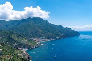 an aerial view of the ocean and a mountain at Casa Ferdimena in Ravello