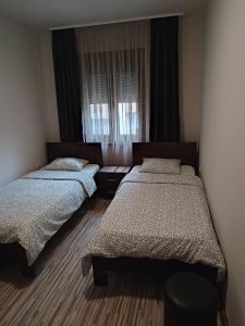 Ένα ή περισσότερα κρεβάτια σε δωμάτιο στο Coco Studio Apartment