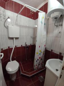 Ένα μπάνιο στο Coco Studio Apartment