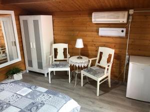 Ένα ή περισσότερα κρεβάτια σε δωμάτιο στο Camping Torremolinos