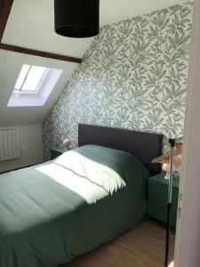 Postel nebo postele na pokoji v ubytování Appartement F2