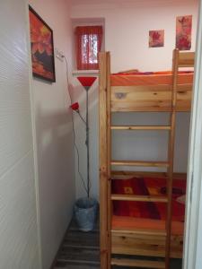 Postel nebo postele na pokoji v ubytování Grevia Apartmanok