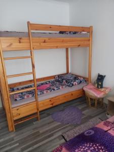 Postel nebo postele na pokoji v ubytování Grevia Apartmanok