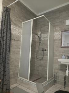 Koupelna v ubytování Grevia Apartmanok