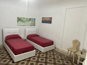 Posteľ alebo postele v izbe v ubytovaní Casa Rita in Piazza Marina