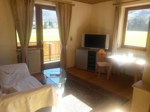 Postel nebo postele na pokoji v ubytování Landhaus Greiderer