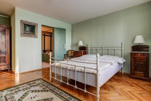 Posteľ alebo postele v izbe v ubytovaní Vila Austerlitz