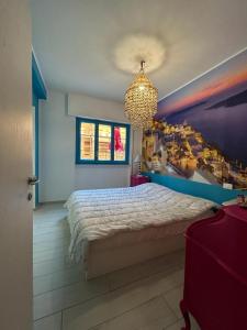 Letto o letti in una camera di Santorini in Finale