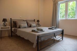 Postel nebo postele na pokoji v ubytování Serenity Guesthouse