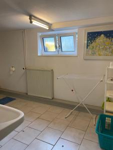 Koupelna v ubytování Van Kim 2 - Souterrain Monteurwohnung + 4 fotografie