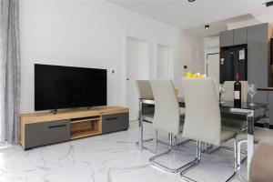 Μια τηλεόραση ή/και κέντρο ψυχαγωγίας στο Mirjam Apartman +10 φωτογραφίες