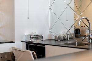 Kuchyňa alebo kuchynka v ubytovaní Ga Luxury Apartments M54
