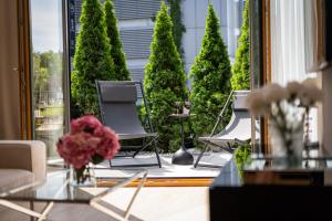Posedenie v ubytovaní Ga Luxury Apartments M54