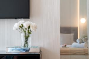 Posteľ alebo postele v izbe v ubytovaní Ga Luxury Apartments M54