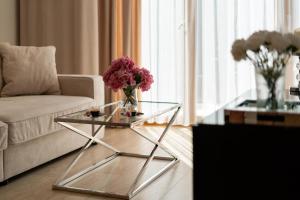Posedenie v ubytovaní Ga Luxury Apartments M54