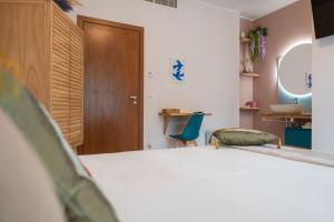 Postel nebo postele na pokoji v ubytování Noi 2 nel Cilento