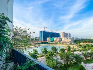 a view of a city from a balcony at Green Line Long Bien - Serviced Apartment - Ngoc Thuy - Hanoi in Hanoi