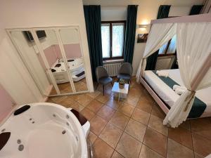 Postel nebo postele na pokoji v ubytování Residenza Catullo