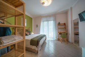 Postel nebo postele na pokoji v ubytování Noi 2 nel Cilento
