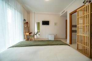 Postel nebo postele na pokoji v ubytování Noi 2 nel Cilento