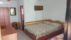 Postel nebo postele na pokoji v ubytování Casa Dexter