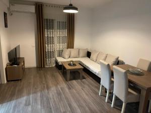 TV a/nebo společenská místnost v ubytování Apartmani B&A