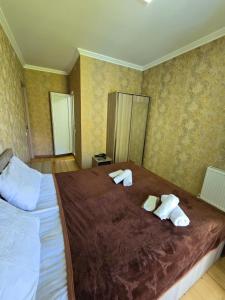 Ένα ή περισσότερα κρεβάτια σε δωμάτιο στο Hotel Garbani