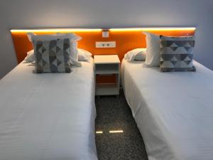 A bed or beds in a room at Bahia Colon