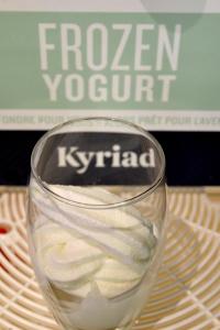 a glass of ice cream in front of a box at KYRIAD HONFLEUR - La Riviere Saint Sauveur in Honfleur