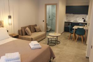 Η κουζίνα ή μικρή κουζίνα στο Dunes Luxury Apartments