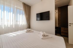 Katil atau katil-katil dalam bilik di New Luxury Villa with private pool - by TA Leut Agency +94 gambar