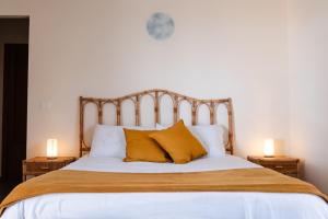 Postel nebo postele na pokoji v ubytování Rifugio Etna Soul Camere con bagno privato