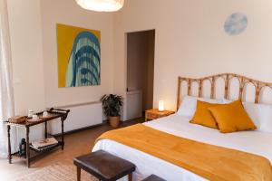 Postel nebo postele na pokoji v ubytování Rifugio Etna Soul Camere con bagno privato