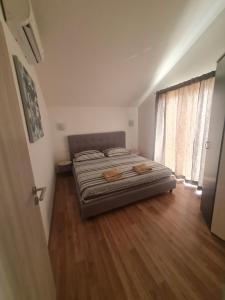 Posteľ alebo postele v izbe v ubytovaní Luxury apartment Duće with private pool