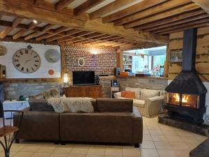 Posezení v ubytování Les Gabelous - chambre d'hôtes avec petit-déjeuner à Viroinval
