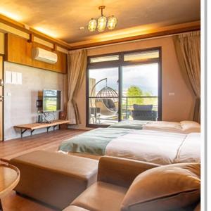 Postel nebo postele na pokoji v ubytování Jiaoxi Pusu Homestay
