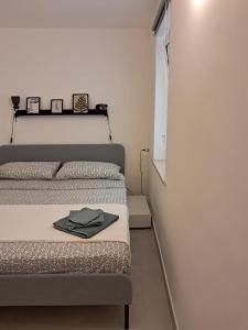 Postel nebo postele na pokoji v ubytování Nonna Jaca Apartment