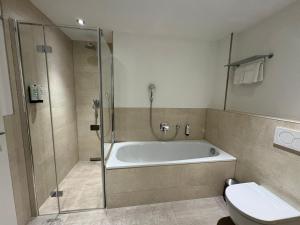 Koupelna v ubytování Fontane Hotel