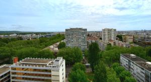 an aerial view of a city with tall buildings at Appart' Parc in Villeurbanne