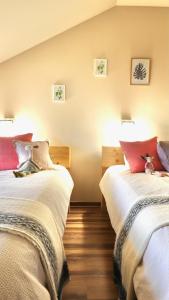 Postel nebo postele na pokoji v ubytování Mimi Boutique Farm Stay & Cuisine