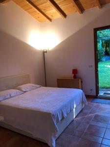 Postel nebo postele na pokoji v ubytování Casa Rosetta