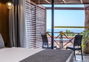 A balcony or terrace at Adora Calma Beach Hotel Adults Only