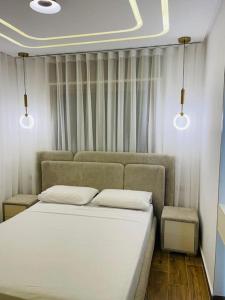 Letto o letti in una camera di Little Gem