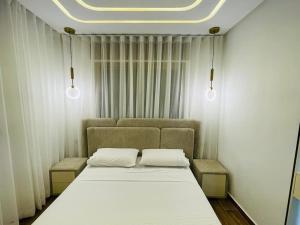 Letto o letti in una camera di Little Gem