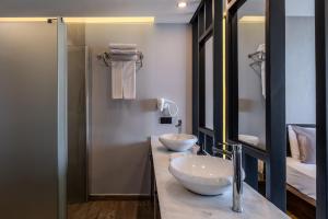 A bathroom at Adora Calma Beach Hotel Adults Only