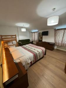Postel nebo postele na pokoji v ubytování Hotel Miravalle