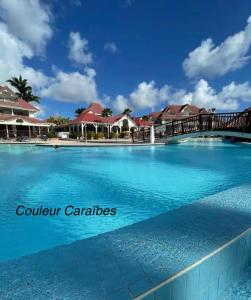 Sundlaugin á Couleur Caraïbes-Ti rêve appartement vue mer pierre&vacances eða í nágrenninu