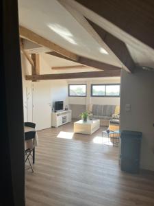 Posezení v ubytování LOFT VILLEBOURBON 40 m2 avec parking