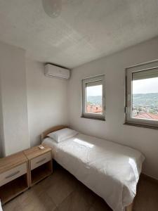 Una cama o camas en una habitación de Villa Ilijas 3 bedrooms