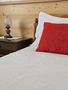 Postel nebo postele na pokoji v ubytování Hotel Miravalle